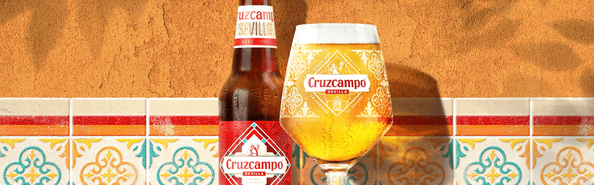 Cruzcampo beer against Spanish tiles